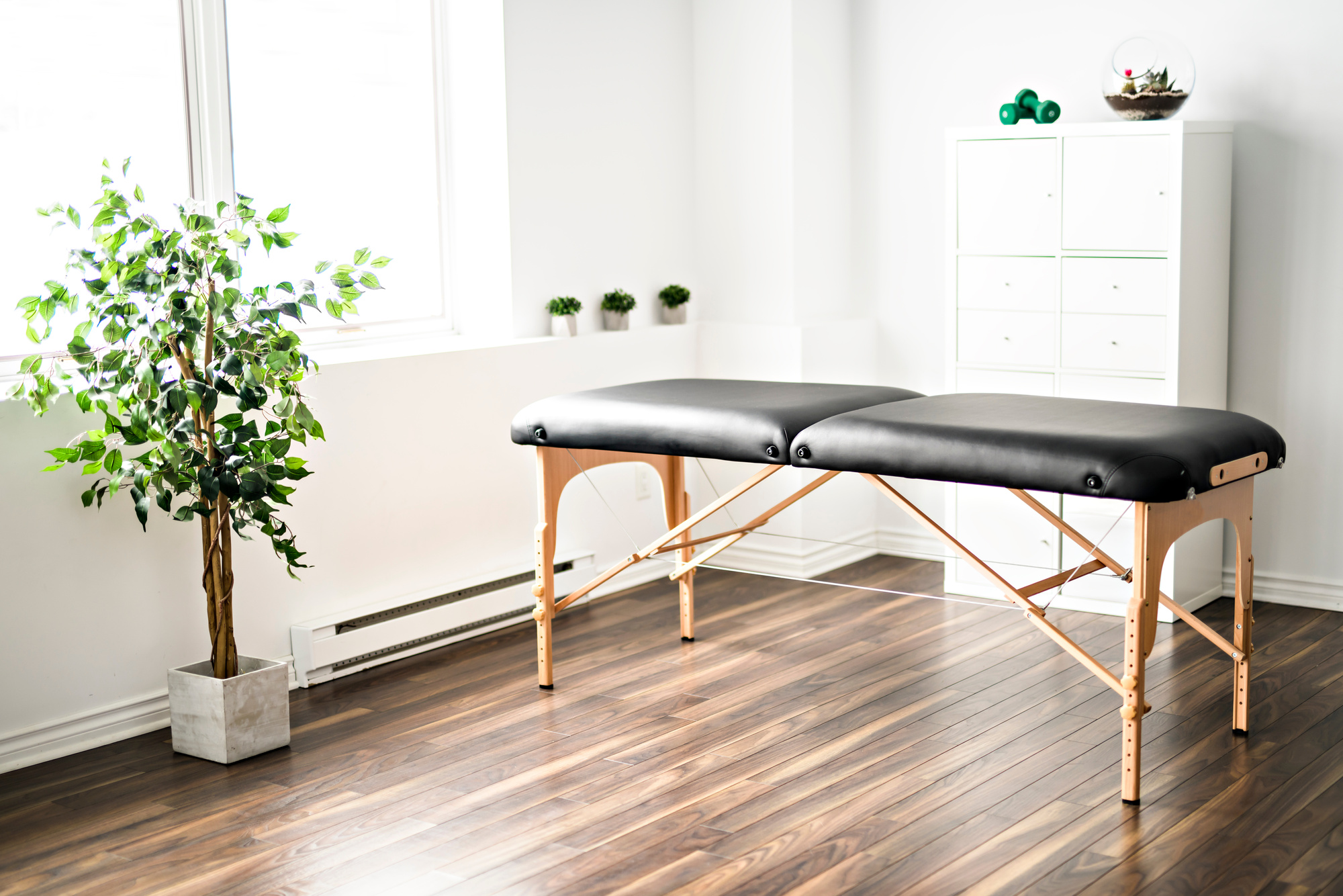 A physiotherapy room with table at work